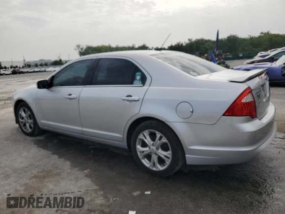 2012 Ford Fusion SE z VIN 3FAHP0HA1CR218938, wystawiony jako Copart lot #59588135 z przebiegiem 111 243 mil mil oraz Szkoda całkowita • Salvage title. Historia ofert i sprzedaży dostępna na DreamBid. Obrazek 2.