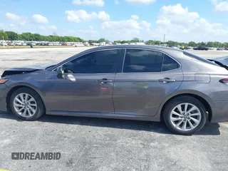 2023 Toyota Camry LE z VIN 4T1C11AK2PU080805, wystawiony jako IAAI lot #42165528 z przebiegiem 28 307 mil mil oraz . Historia ofert i sprzedaży dostępna na DreamBid. Obrazek 14.