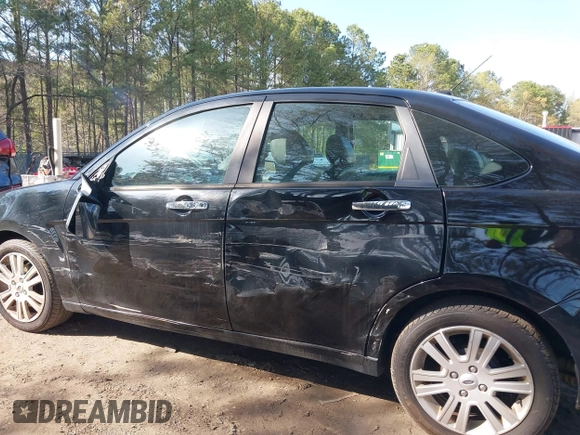 2010 Ford Focus SEL with VIN 1FAHP3HN4AW231889, listed as a IAAI auction lot 41901822 with 129,450 mi miles. Bid and sale history available at carsss.com. Image 6.