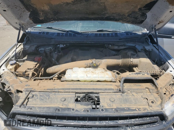 2018 Ford F-150 XL with VIN 1FTEW1CGXJFB40297, listed as a Copart auction lot 69642404 with 92,561 mi miles and Salvage title. Bid and sale history available at DreamBid. Image 11.