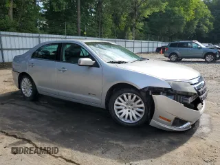 2010 Ford Fusion Hybrid with VIN 3FADP0L34AR178536, listed as a Copart auction lot 59860475 with 227,024 mi miles and Salvage title. Bid and sale history available at DreamBid. Image 4.