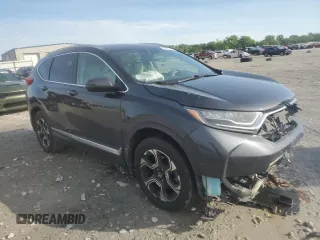 2018 Honda CR-V Touring z VIN 7FARW2H94JE077885, wystawiony jako Copart lot #55451345 z przebiegiem 133 964 mil mil oraz Szkoda całkowita • Salvage title. Historia ofert i sprzedaży dostępna na DreamBid. Obrazek 4.
