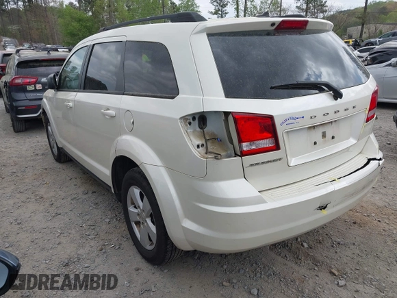 2014 Dodge Journey SE with VIN 3C4PDCABXET135338, listed as a IAAI auction lot 41950088 with 209,944 mi miles. Bid and sale history available at carsss.com. Image 3.