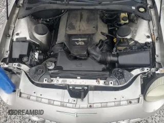 2004 Ford Thunderbird Deluxe z VIN 1FAHP60A84Y104551, wystawiony jako Copart lot #49170085 z przebiegiem 159 696 mil mil oraz Szkody całkowita. Historia ofert i sprzedaży dostępna na DreamBid. Obrazek 11.
