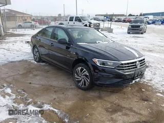 2021 Volkswagen Jetta SEL with VIN 3VWE57BU9MM003642, listed as a IAAI auction lot 41502144 with 80,584 mi miles and . Bid and sale history available at DreamBid. Image 1.