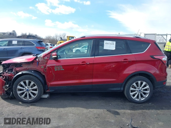 2017 Ford Escape Titanium with VIN 1FMCU0JD9HUC71738, listed as a IAAI auction lot 41673228 with 173,615 mi miles. Bid and sale history available at carsss.com. Image 14.