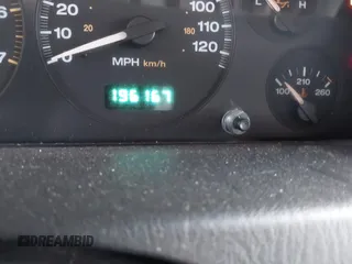 2002 Jeep Grand Cherokee with VIN 1J8GW38S62C219396, listed as a IAAI auction lot 41831930 with 196,167 mi miles and . Bid and sale history available at DreamBid. Image 7.