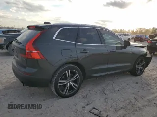 2018 Volvo XC60 Momentum with VIN LYV102RK0JB106389, listed as a Copart auction lot 82677454 with 114,832 mi miles and Salvage Title. Bid and sale history available at carsss.com. Image 3.