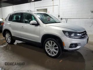2013 Volkswagen Tiguan SE z VIN WVGBV3AX1DW579506, wystawiony jako Copart lot #52719575 z przebiegiem 163 471 mil mil oraz Szkoda całkowita • Salvage title. Historia ofert i sprzedaży dostępna na DreamBid. Obrazek 4.