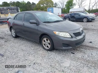 2009 Toyota Corolla with VIN JTDBL40E399032176, listed as a IAAI auction lot 42035968 with 213,062 mi miles. Bid and sale history available at carsss.com. Image 1.