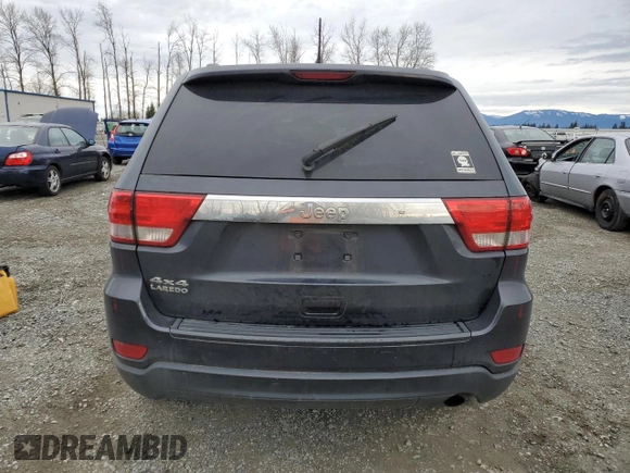 2013 Jeep Grand Cherokee Laredo with VIN 1C4RJFAG6DC630354, listed as a Copart auction lot 49773425 with 113,291 mi miles and Salvage Title. Bid and sale history available at carsss.com. Image 6.