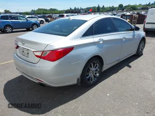 2012 Hyundai Sonata Limited z VIN 5NPEC4AC5CH370901, wystawiony jako IAAI lot #42369650 z przebiegiem 210 863 mil mil oraz . Historia ofert i sprzedaży dostępna na DreamBid. Obrazek 4.
