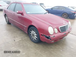 2000 Mercedes-Benz E-Class with VIN WDBJF65J1YB113770, listed as a IAAI auction lot 41462464 with 157,279 mi miles. Bid and sale history available at carsss.com. Image 6.