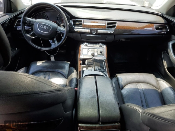 2012 Audi A8 with VIN WAURVAFDXCN026781, listed as a Copart auction lot 59197615 with 160,567 mi miles and Salvage title. Bid and sale history available at DreamBid. Image 8.