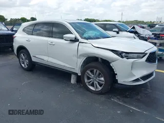 2022 Acura MDX with VIN 5J8YD9H33NL009924, listed as a IAAI auction lot 42352694 with 22,736 mi miles and . Bid and sale history available at DreamBid. Image 1.