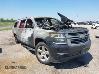 2016 Chevrolet Suburban LTZ with VIN 1GNSCJKCXGR268158, listed as a IAAI auction lot 41988646 with Not provided miles and . Bid and sale history available at DreamBid. Image 1.