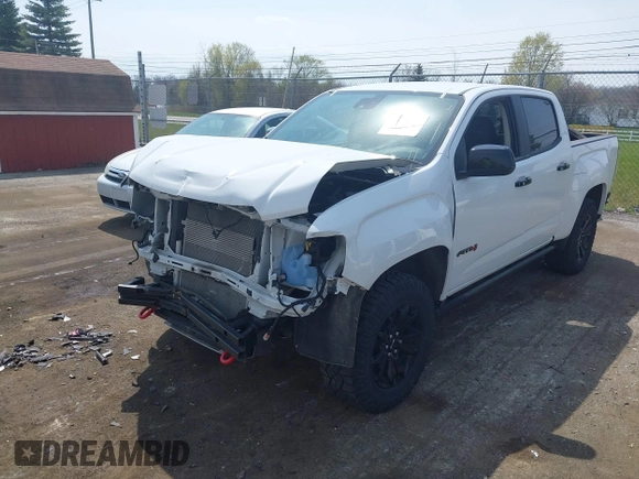 2021 GMC Canyon 4WD AT4 z VIN 1GTG6FENXM1291689, wystawiony jako IAAI lot #42038884 z przebiegiem 54 884 mil mil oraz . Historia ofert i sprzedaży dostępna na DreamBid. Obrazek 17.