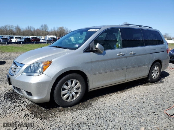 2009 Honda Odyssey EX-L with VIN 5FNRL38679B032483, listed as a Copart auction lot 52415395 with 86,497 mi miles and Salvage Title. Bid and sale history available at carsss.com. Image 1.