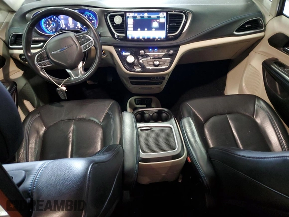 2021 Chrysler Pacifica Touring L with VIN 2C4RC1BGXMR588001, listed as a Copart auction lot 54562505 with 128,350 mi miles and Salvage title. Bid and sale history available at DreamBid. Image 8.