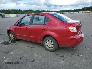 2012 Suzuki SX4 LE with VIN JS2YC5A34C6300079, listed as a Copart auction lot 68414434 with 111,661 mi miles and Salvage Title. Bid and sale history available at carsss.com. Image 2.
