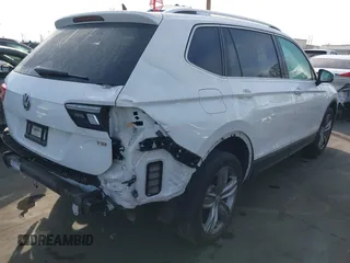 2018 Volkswagen Tiguan SEL Premium with VIN 3VV5B7AX5JM176434, listed as a IAAI auction lot 41684514 with 47,988 mi miles and . Bid and sale history available at DreamBid. Image 4.
