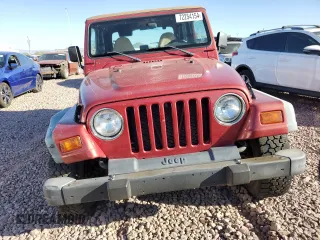 1998 Jeep Wrangler SE with VIN 1J4FY29P7WP792463, listed as a Copart auction lot 72254154 with 179,114 mi miles and Salvage Title. Bid and sale history available at carsss.com. Image 5.