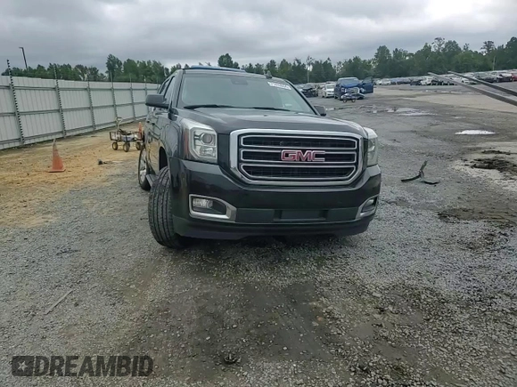 2018 GMC Yukon SLT with VIN 1GKS1BKC2JR314890, listed as a Copart auction lot 71433654 with 95,863 mi miles and Salvage Title. Bid and sale history available at DreamBid. Image 12.