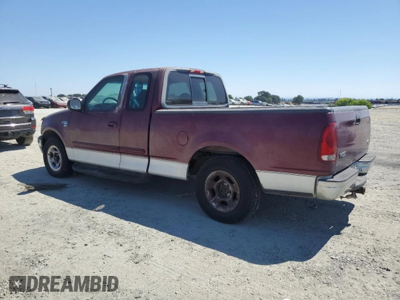 1999 Ford F-150 XL with VIN 1FTRX17L2XKB78998, listed as a Copart auction lot 65004535 with 155,271 mi miles and Salvage title. Bid and sale history available at DreamBid. Image 2.