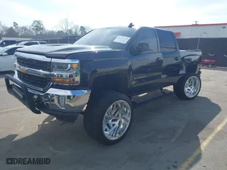 2016 Chevrolet Silverado 1500 LT with VIN 1GCRCREC1GZ374418, listed as a IAAI auction lot 41767741 with 123,632 mi miles. Bid and sale history available at carsss.com. Image 2.