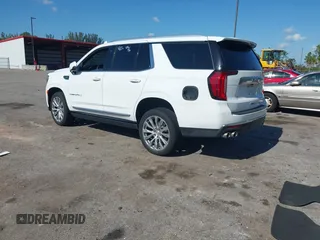 2023 GMC Yukon Denali with VIN 1GKS1DKL2PR303909, listed as a IAAI auction lot 42018679 with 65,532 mi miles. Bid and sale history available at carsss.com. Image 3.