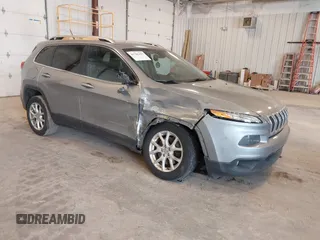 2014 Jeep Cherokee Latitude with VIN 1C4PJLCS1EW106004, listed as a IAAI auction lot 41786457 with 145,588 mi miles. Bid and sale history available at carsss.com. Image 1.