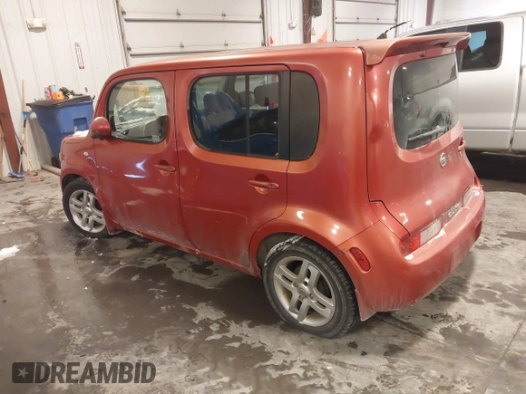 2009 Nissan Cube SL z VIN JN8AZ28R29T119001, wystawiony jako IAAI lot #41583215 z przebiegiem 203 906 mil mil oraz . Historia ofert i sprzedaży dostępna na DreamBid. Obrazek 3.