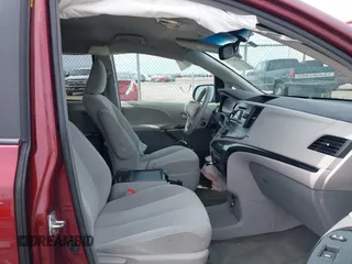 2014 Toyota Sienna LE AAS with VIN 5TDKK3DC4ES462090, listed as a IAAI auction lot 41942354 with 215,814 mi miles. Bid and sale history available at carsss.com. Image 5.