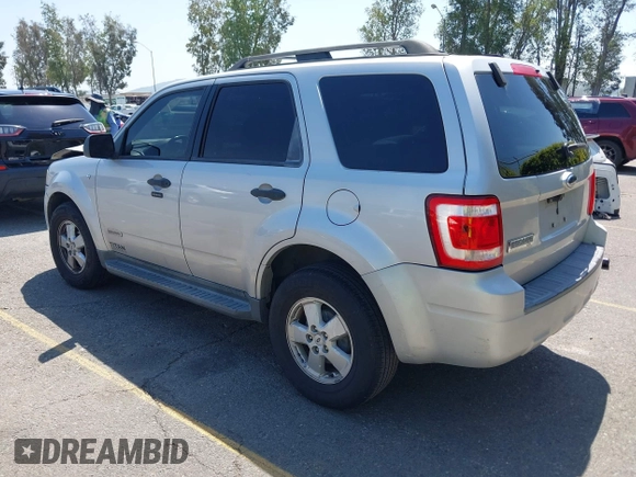2008 Ford Escape XLT with VIN 1FMCU03168KA77375, listed as a IAAI auction lot 41990755 with 173,455 mi miles and . Bid and sale history available at DreamBid. Image 3.