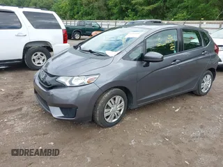 2015 Honda Fit LX z VIN 3HGGK5H59FM714352, wystawiony jako IAAI lot #42156097 z przebiegiem 103 587 mil mil oraz . Historia ofert i sprzedaży dostępna na DreamBid. Obrazek 17.
