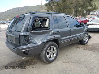 2004 Jeep Grand Cherokee Limited with VIN 1J8GX58N34C360819, listed as a IAAI auction lot 41816348 with 144,609 mi miles and . Bid and sale history available at DreamBid. Image 4.