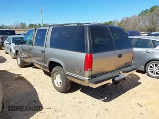 1999 Chevrolet Suburban with VIN 3GNEC16R1XG198724, listed as a IAAI auction lot 41812563 with 207,922 mi miles. Bid and sale history available at carsss.com. Image 3.