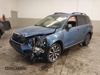 2017 Subaru Forester Touring with VIN JF2SJGTC9HH410251, listed as a IAAI auction lot 41411079 with 131,220 mi miles and . Bid and sale history available at DreamBid. Image 17.