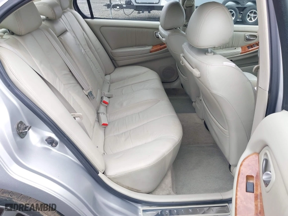 2002 Infiniti I35 Luxury with VIN JNKDA31A22T005398, listed as a IAAI auction lot 41818757 with 165,228 mi miles. Bid and sale history available at carsss.com. Image 8.