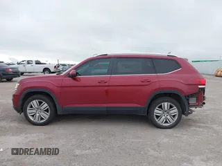2019 Volkswagen Atlas SE with VIN 1V2WR2CA4KC606661, listed as a IAAI auction lot 42581054 with 89,079 mi miles and . Bid and sale history available at DreamBid. Image 14.