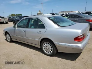 2002 Mercedes-Benz E-Class with VIN WDBJF82J92X065591, listed as a Copart auction lot 65841964 with 155,195 mi miles and Salvage Title. Bid and sale history available at carsss.com. Image 2.