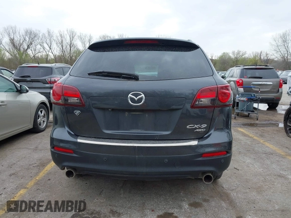 2015 Mazda CX-9 Touring with VIN JM3TB3CA3F0460864, listed as a IAAI auction lot 41944957 with 242,100 mi miles. Bid and sale history available at carsss.com. Image 16.