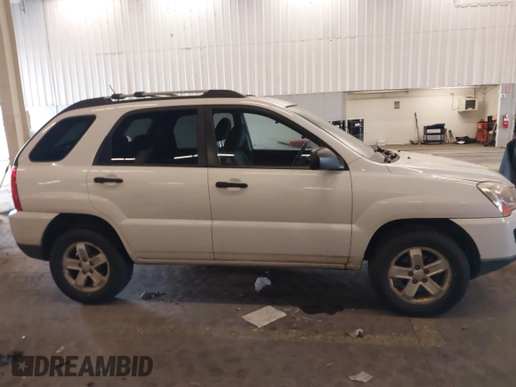 2009 Kia Sportage LX with VIN KNDJE723497563630, listed as a IAAI auction lot 41911423 with 213,040 mi miles. Bid and sale history available at carsss.com. Image 13.