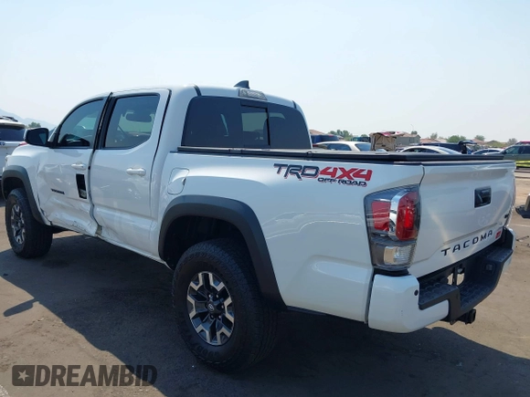 2023 Toyota Tacoma SR with VIN 3TMCZ5AN7PM630874, listed as a IAAI auction lot 40298041 with 8,635 mi miles and . Bid and sale history available at DreamBid. Image 3.