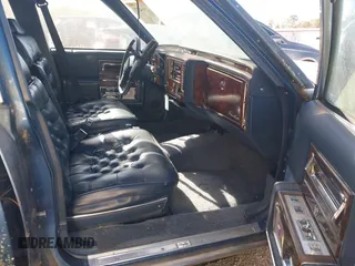 1992 Cadillac Brougham z VIN 1G6DW54EXNR707566, wystawiony jako IAAI lot #41854321 z przebiegiem Nie podano mil oraz . Historia ofert i sprzedaży dostępna na DreamBid. Obrazek 5.