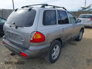 2004 Hyundai Santa Fe GLS with VIN KM8SC13D74U700404, listed as a IAAI auction lot 41735889 with 208,946 mi miles. Bid and sale history available at carsss.com. Image 4.