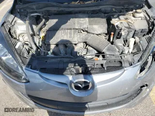 2012 Mazda Mazda2 Sport with VIN JM1DE1KZXC0152070, listed as a Copart auction lot 71793854 with 127,833 mi miles and Salvage Title. Bid and sale history available at carsss.com. Image 11.