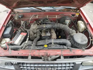 1995 Isuzu Pickup S z VIN JAACL11LXS7202252, wystawiony jako Copart lot #70393254 z przebiegiem 290 933 mil mil oraz Szkody całkowita. Historia ofert i sprzedaży dostępna na DreamBid. Obrazek 11.