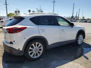 2014 Mazda CX-5 Grand Touring with VIN JM3KE4DY6E0363211, listed as a Copart auction lot 48352315 with 214,298 mi miles and Salvage Title. Bid and sale history available at DreamBid. Image 3.