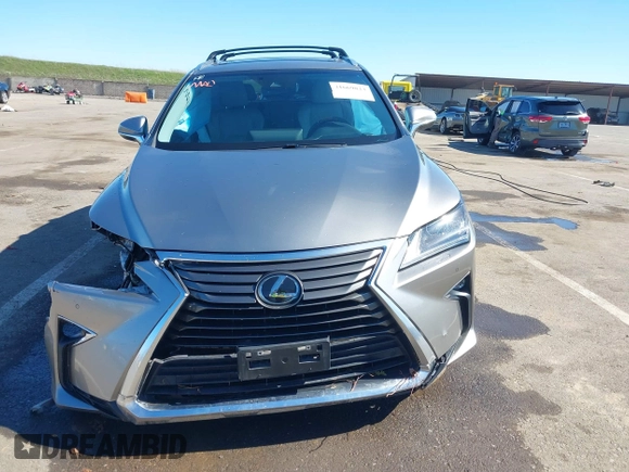 2018 Lexus RX 350 z VIN 2T2BZMCA7JC140852, wystawiony jako IAAI lot #41669823 z przebiegiem 56 306 mil mil oraz . Historia ofert i sprzedaży dostępna na DreamBid. Obrazek 12.
